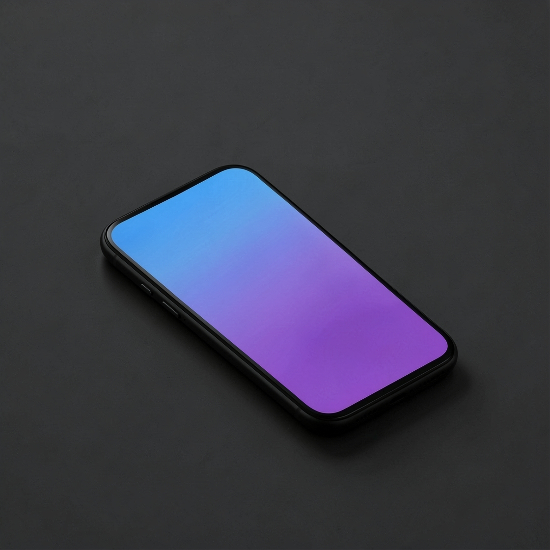 Generic smartphone with a blue and violet gradient screen on a dark desk